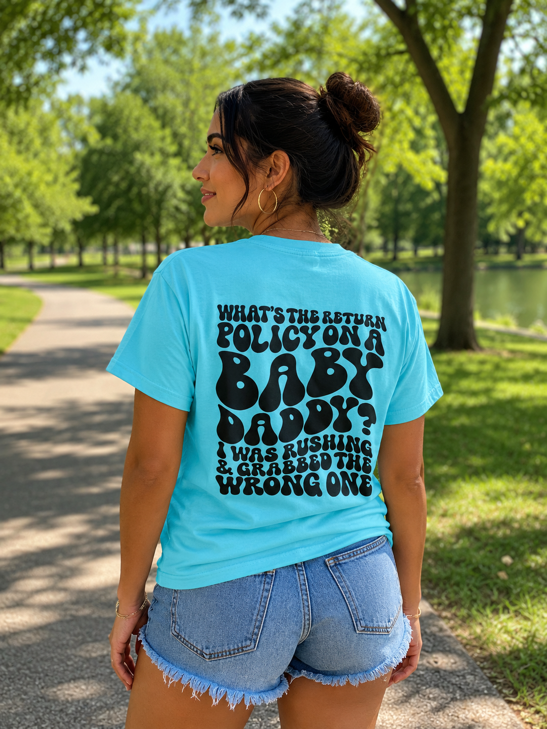 Graphic T-Shirt — "What's the Return Policy on a Baby Daddy?" Retro Typography Tee